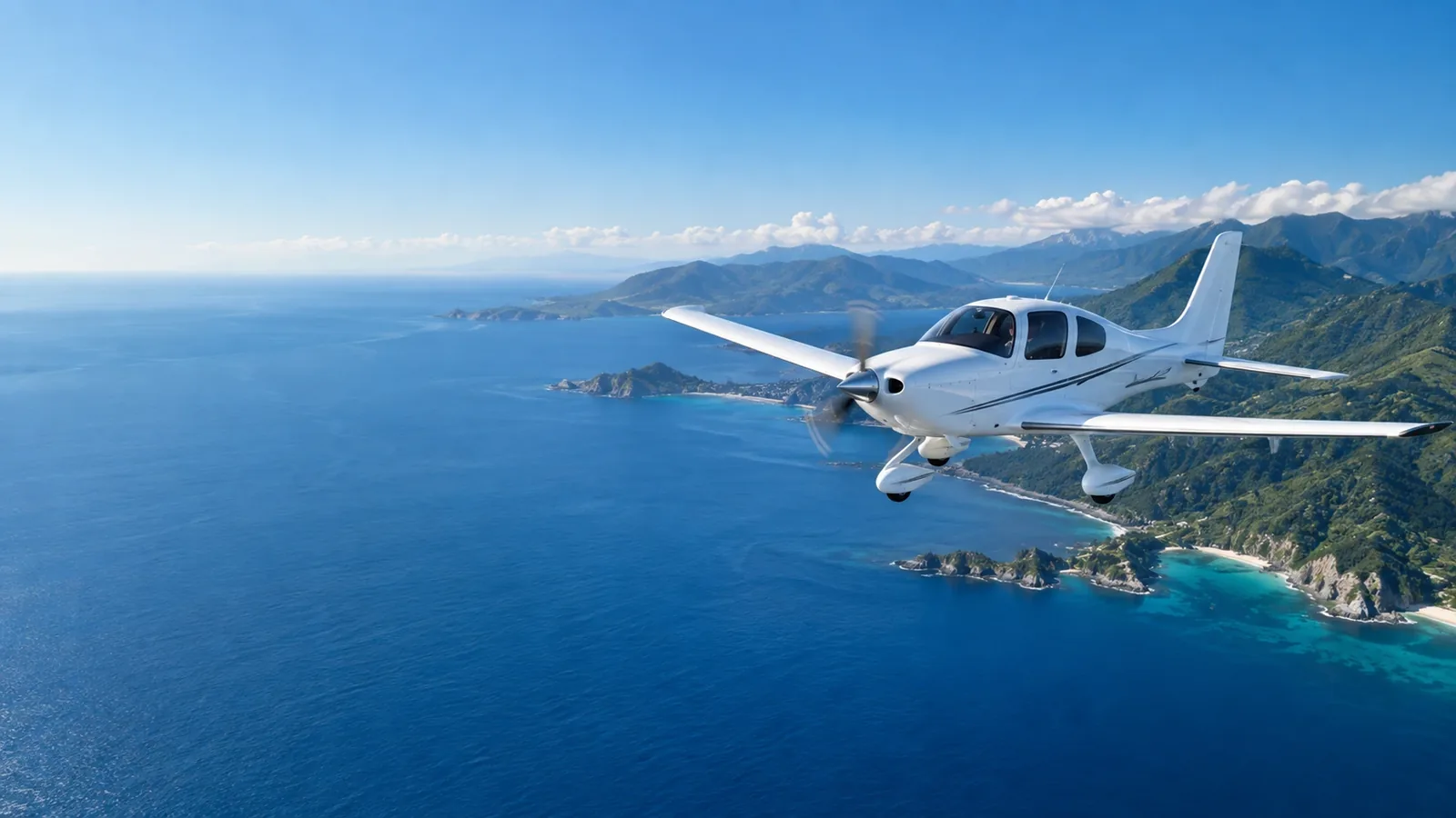 Light aircraft over a blue coastal landscape
